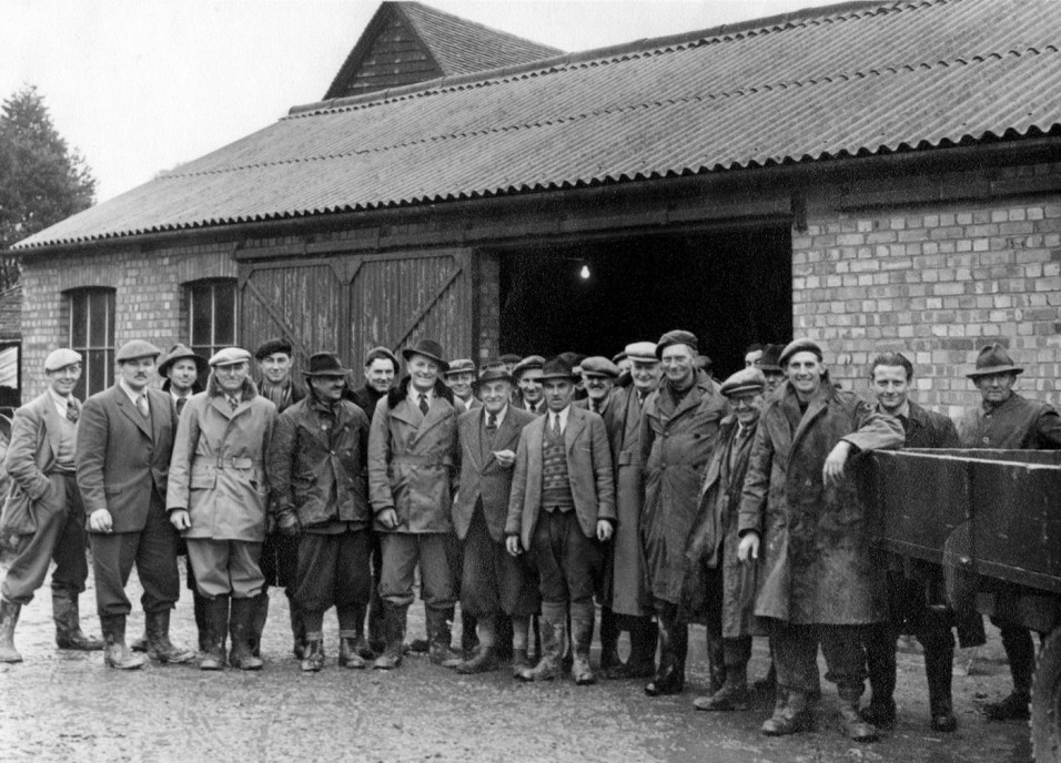 Village farmers and farm workers meeting at Walnut Tree Farm for a hare shoot. By the end of the century these animals had declined greatly in number. L-R: Derek Cook, Frank Kaiser, Denis Hibberd, Philip Walker, Clive Taylor, Eric Blundell, ?, Stan Walker, ?, Laurie Franklin, ?, William Annison, Walter Lawrence, ?, Sid Tooley, Jim Hoye, Teddy Cooper, Ray Tooley, Arthur Carter.