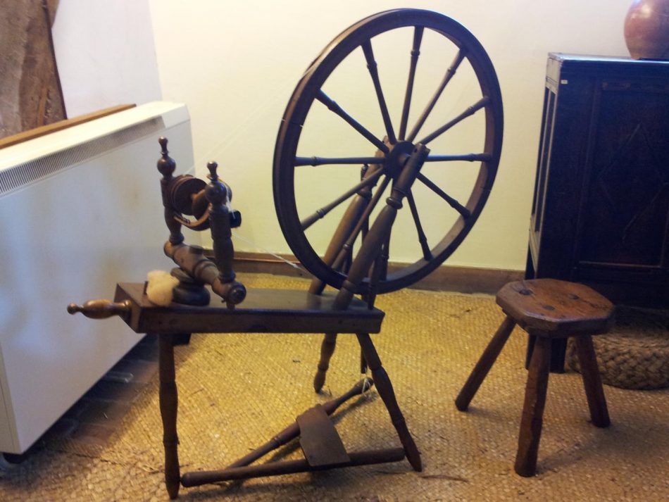 Spinning wheels were used to spin wool and flax for linen.
