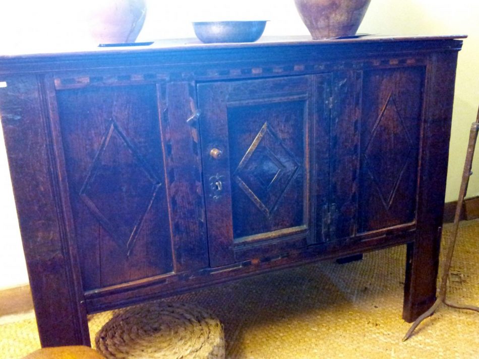 
A closed cupboard with doors.
