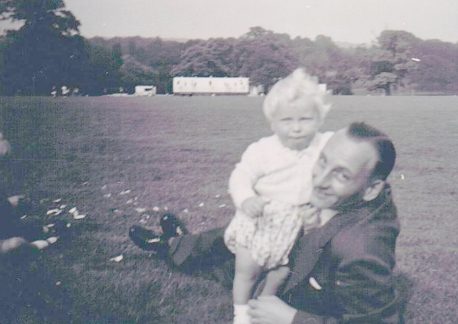 Bernard Lake, Tom and Miriam’s son, holding his son Stephen.
