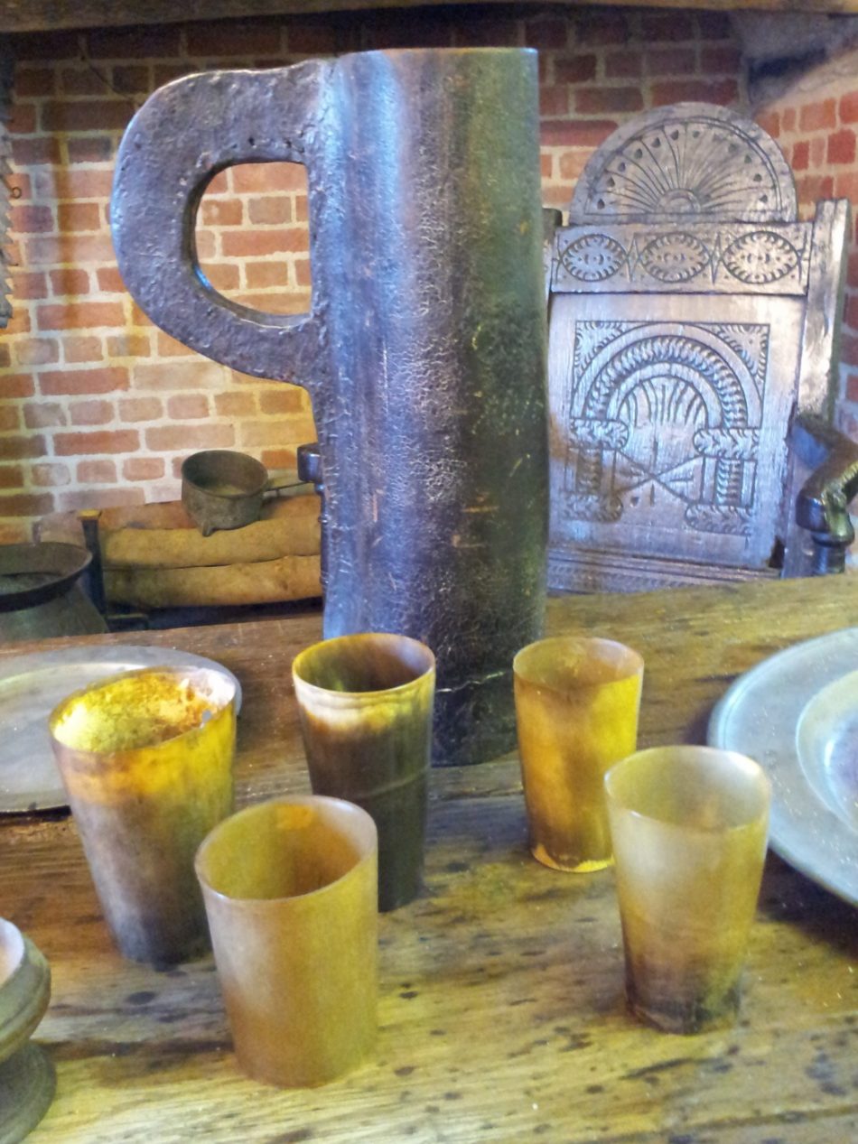 Horn beakers and leather jug.
