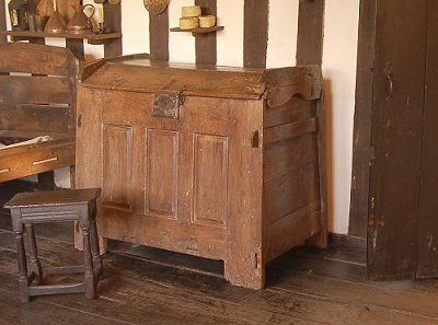 A coffer with a domed lid. Clothes were often kept in these and were kept locked.